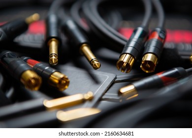 Audio cables for sound recording studio. Professional wires with 3.5 jack connectors to connect musical equipment. Curated collection of royalty free stock images for music wallpaper and poster design
