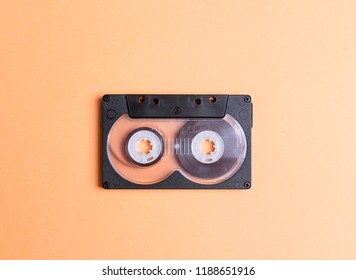 Audio Cassette Tape On A Yellow Background. Nostalgia Concept.