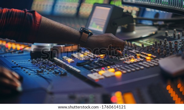 Audio
Engineer, Music Creator, Musician, Artist Works in the Music Record
Studio, Uses Surface Control Desk Equalizer Mixer. Buttons, Faders,
Sliders to Broadcast, Record, Play Hit
Song.