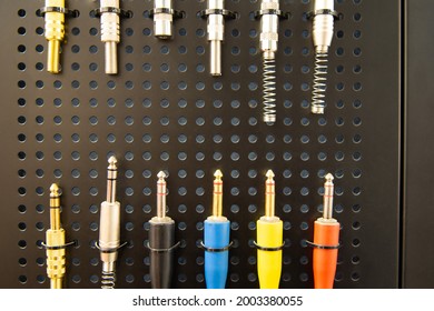 Audio Jacks For Connecting Musical Instruments, Sold On Display In A Musical Equipment Store.