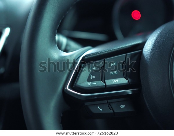 Audio and phone\
control button on car\
steering