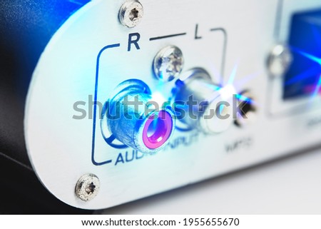 Audio receiver back panel with inputs output for connecting equipment and output to amplifier.