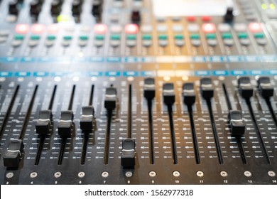 Audio studio sound mixer equalizer board controls, top view clos