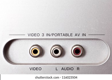 Audio and video sockets on the back of a stereo amplifier