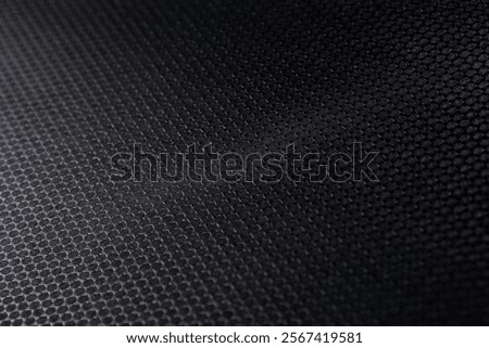Audiovisual case texture with black hexagonal shapes. Concept: Textures, audiovisual, suitcase.