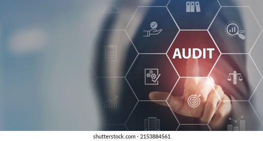Audit business concept. Examination and evaluation of the financial statement of an organization; income statement, balance sheet, cash flow statement. Businessman touching on audit, smart background. - Shutterstock ID 2153884561