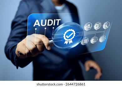 Audit concept with auditor using magnifying glass to search the evaluation activity for annual assessment in standards requirement scope