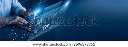 Audit network connection concept. Auditor hand working on a laptop computer with graphical financial verification compliance monitoring transaction accuracy control review documentation.