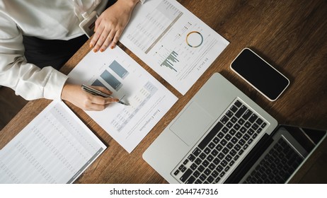 Auditor Or Internal Revenue Service Staff, Business Women Checking Annual Financial Statements Of Company. Audit Concept