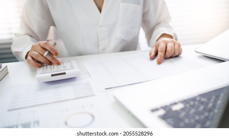 Auditor Or Internal Revenue Service Staff, Business Women Checking Annual Financial Statements Of Company. Audit Concept.