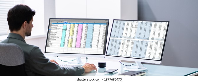Auditor Spreadsheet Report On Desktop Computer Screen
