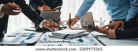 Auditor team collaborate in office, analyzing financial data and accounting record. Expertise in finance and taxation with accurate report and planning for company revenue, expense and budget. Insight