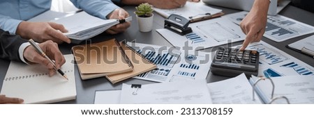 Auditor team collaborate in office, analyzing financial data and accounting record. Expertise in finance and taxation with accurate report and planning for company revenue, expense and budget. Insight