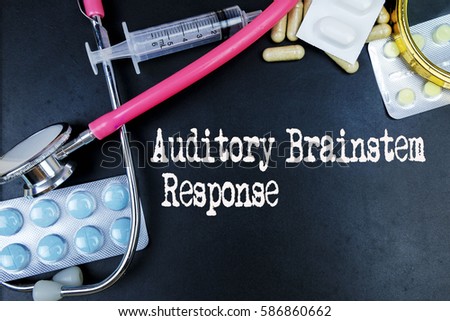 Auditory Brainstem Response word, medical term word with medical concepts in blackboard and medical equipment background.