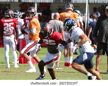 Aug 18, 2021; Tampa, FL USA;  Tampa Bay Buccaneers quarterback Tom Brady (12) throws a pass during NFL training camp.