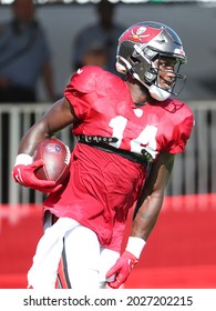 Aug 18, 2021; Tampa, FL USA;  Tampa Bay Buccaneers Wide Receiver Chris Godwin (14) Runs After A Catch From Tom Brady (12) During NFL Training Camp.