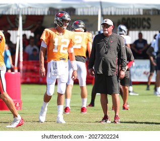 Aug 18, 2021; Tampa, FL USA;  Tampa Bay Buccaneers quarterback Tom Brady (12) talks with head coach Bruce Arians during NFL training camp.