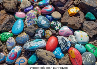aughlin, NV / USA – February 19, 2020: Painted rocks from the community memorial project entitled The Tree of Life and Hope at Pyramid Canyon Day Use Area In Laughlin, Nevada.