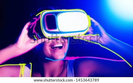 Augmented reality, science, future technology, robots and people concept. Beautiful woman in vr 3d glasses, bright colorful background