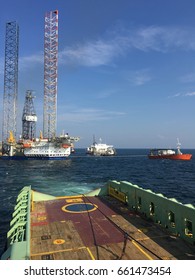 August 15, 2016 - Semi submersible ship being submerged to allow a jack up entering the main deck area before lifting up to transport the rig to Vietnam.