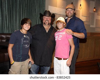 August 16, 2011 - Athens, GA - Colt Ford And James Otto With Young Fans. At A Benefit For The Family Of Elmer 