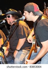 August 16, 2011 - Athens, GA - Colt Ford And Rhett Akins. At A Benefit For The Family Of Elmer 