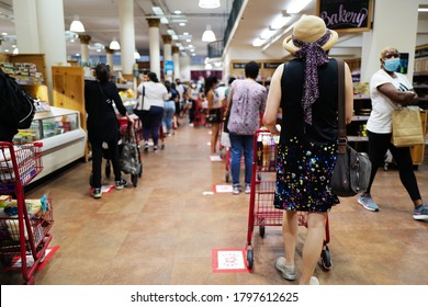 August 16, 2020 Customer At Trader Joe's At Chelsea Lining Up With Masks For The Register, New York City, USA