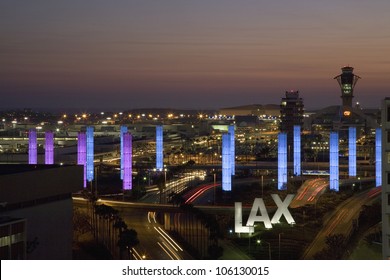 AUGUST 2007 - Aerial view of LAX Los Angeles International Airport at sunset with decorative light tubes, Los Angeles, California