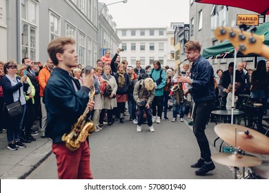 August 2016, Reykjavik, Iceland.  Jazz Band Playing To The Crowd Of People On A Street At The Day Of 