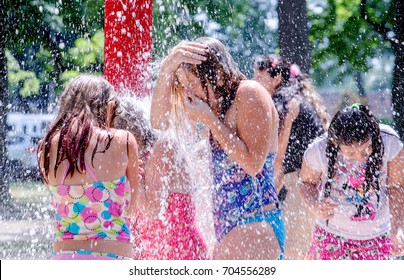 August 2017 South Bend IN USA; Kids Are  Happily Drenched In Water As They  Play In The Splash Pad At  Pottawatomie Park.