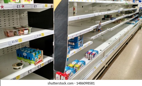 August 2019, Swansea, Wales.
Shelves And Fridges Empty At Tesco.
Shortage Of Food, Supply Issues Because Of Brexit. Import Blockades, Inflation