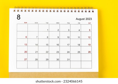 August 2023 Monthly desk calendar for 2023 year on yellow background.
