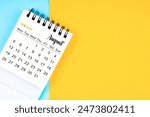 August 2024, Monthly desk calendar for 2024 year on yellow and blue color background.