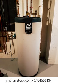 August 21, 2019. Cumberland, Rhode Island, USA. 40 Gallon Smart High Efficiency Water Heater Storage Tank In The Basement Of A Residential Home.