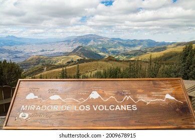 August 21, 2019, Quito, Ecuador - Beautiful View Point With A Wooden Map Indicating Mountains And Volcanos Of Andes Mountains In Ecuador.