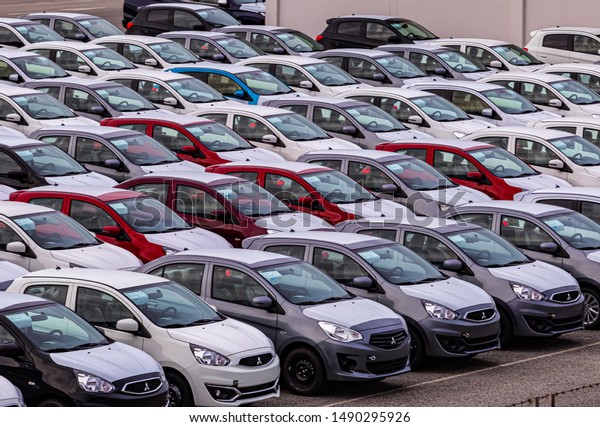 August 24, 2019 Thailand is the car production
base of the leading companies  A lot of cars in Laem Chabang Port
are waiting to be exported to foreign countries, Chonburi,
Thailand
