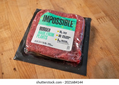 August 24, 2020: Package Of Vegan Meat, Brand Name Impossible Burger On A Wooden Board