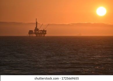 August 5, 2019. Offshore oil rig sunset seascape in Huntington Beach, California USA. 