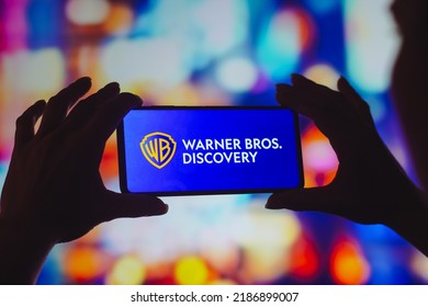 August 6, 2022, Brazil. In This Photo Illustration, The Warner Bros. Discovery Logo Is Displayed On A Smartphone Screen