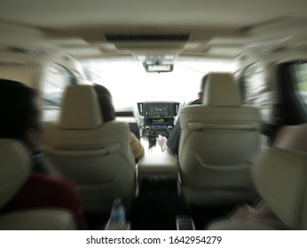 August 8th, 2019, Jakarta, Indonesia. Inside Minibus Car With Zoomed Motion Blur, People Car Passanger Sit In Car Moving Forward To Bright Light, Minutes From Crash Accident Concept