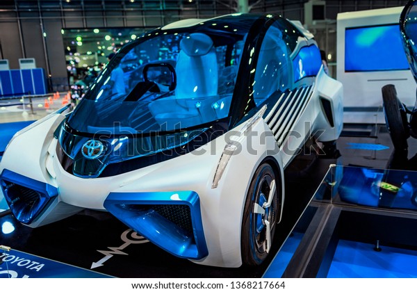 August, Japan, Tokyo.2018, Auto car\
exhibition. Auto of the future, the company Tayota. Auto exhibition\
of cars of the future. The car of the future is\
blue.