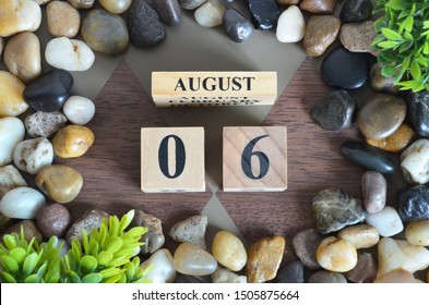 August month, Background with number cube, colorful stone, design in natural concept, Date 6.