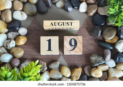 August month, Background with number cube, colorful stone, design in natural concept, Date 19.