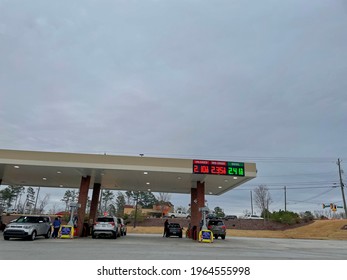 Augusta, Ga USA - 01 21 21: People Pumping Gas And Gas Prices - Kroger Hereford Farm Road