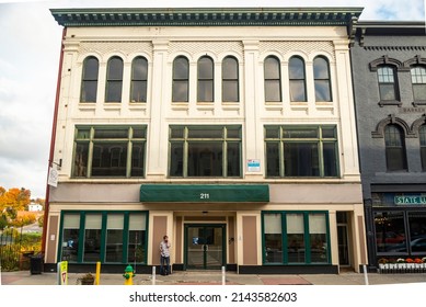 AUGUSTA, MAINE - OCTOBER 16, 2021: Brightly colored store fronts and buildings in the historical Main Street in the city of Augusta, Maine