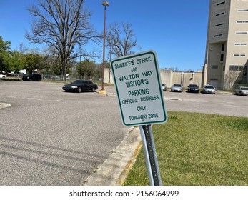 AUGUSTA, UNITED STATES - May 05, 2022: Augusta, Ga USA - Old Closed Richmond County Jail Restricted Parking Sign