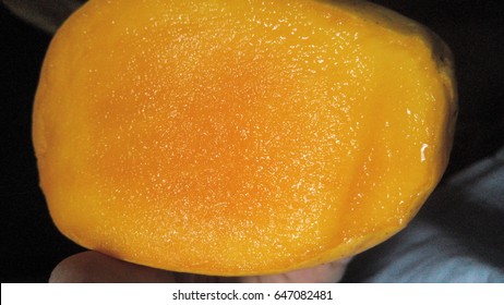 Aura Of Mango. Close-up Of Mango Flesh Great For Yellow Background And Texture. 