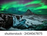 Aurora borealis or northern lights over Kirkjufell Mountain in Iceland

