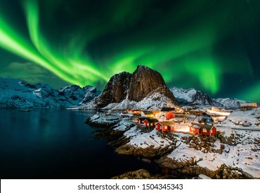 Aurora borealis over Hamnoy in Norway - Powered by Shutterstock
