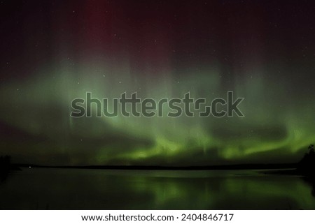 Aurora Borealis overlooking Nutimik lake, Manitoba Canada ストックフォト © 